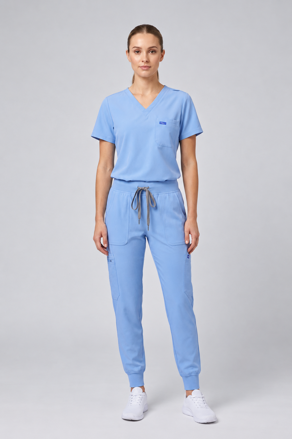 Fun Scrub ScrubTech Luxe women's ceil blue V-neck scrub top and jogger scrub pants front view