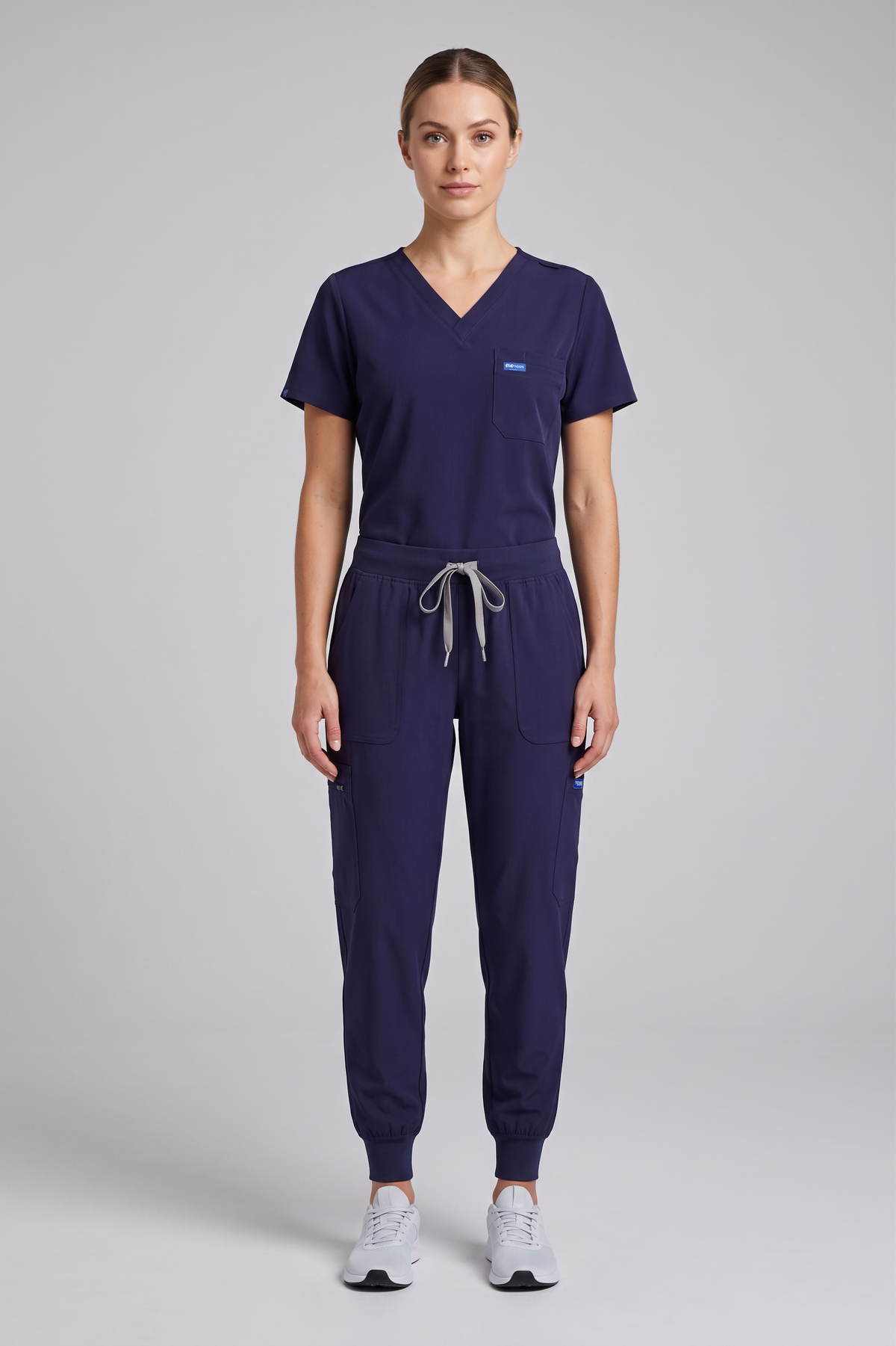 Fun Scrub ScrubTech Luxe women's navy V-neck scrub top and jogger scrub pants front view